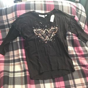 Girls long sleeve t shirt Wonder Woman graphic tee.